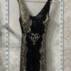 Vestido de fiesta negro con dorado de lentejuelas