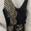 Vestido de fiesta negro con dorado de lentejuelas